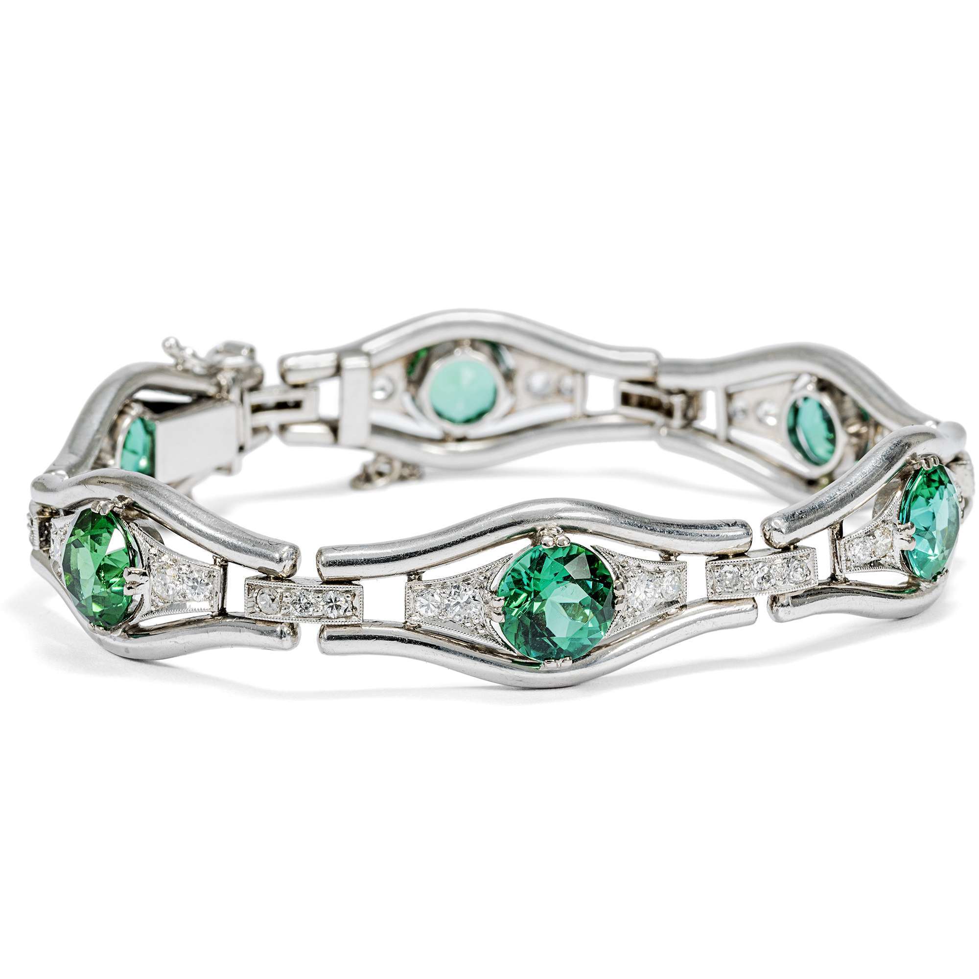 624762-hofer-antikschmuck-Elegantes-Armband-mit-gruenen-Turmalinen-und-Diamanten-in-Weissgold-um-1950-Es-gruent-so-gruen